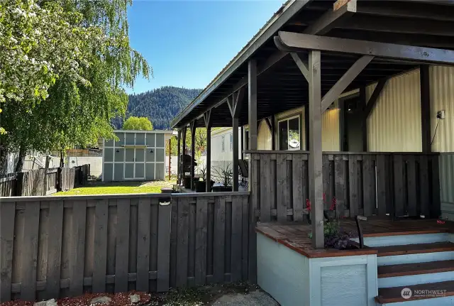 Fully fenced yard, 2 car carport, new covered deck & shed. Territorial mountain view, Wenatchee River is just across the street.
