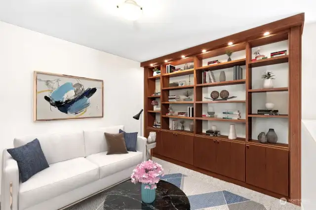 Den with custom California Closets library shelving & cabinetry (Virtually-staged)