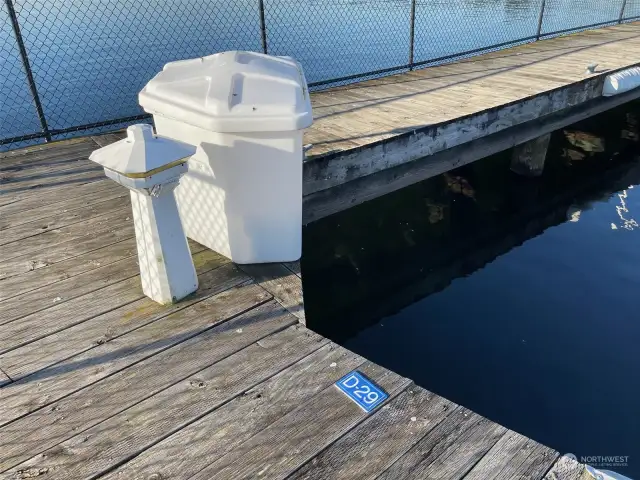 End Boat Slip includes Water, Power and Dock Box for Storage.