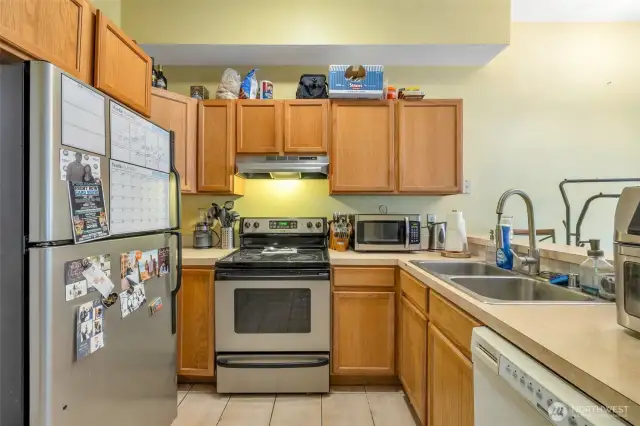 Spacious kitchen with ample storage and counterspace - plus double sink. All of your needs covered!