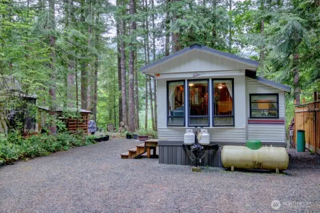 Backs to greenspace with river views!