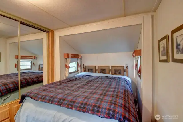 Bedroom with a closet and storage space
