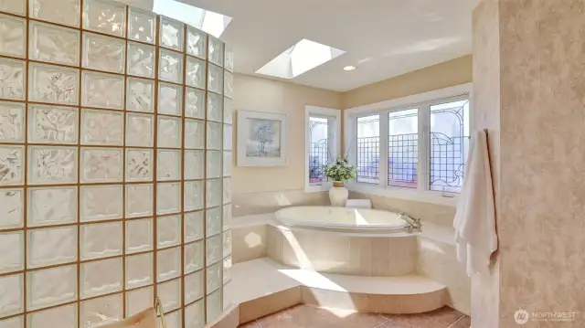 Imagine sunlit tranquility while soaking in the jetted soaking tub......