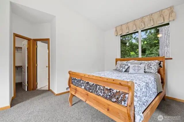 master bedroom with large walk in closet & on suite bathroom
