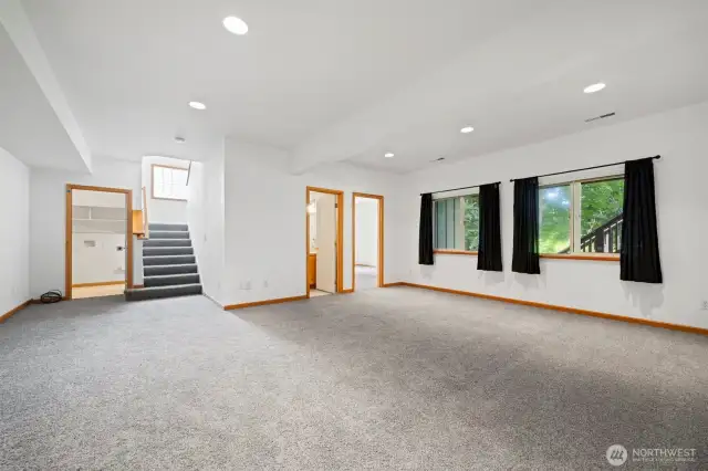 big open family room located on lower level walk out to yard
