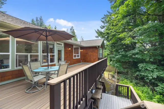 deck faces west with stairs to the backyard