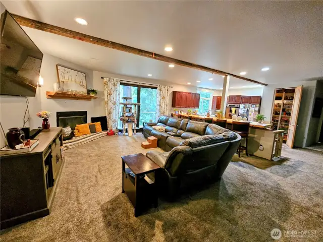 View of second floor living room and kitchen