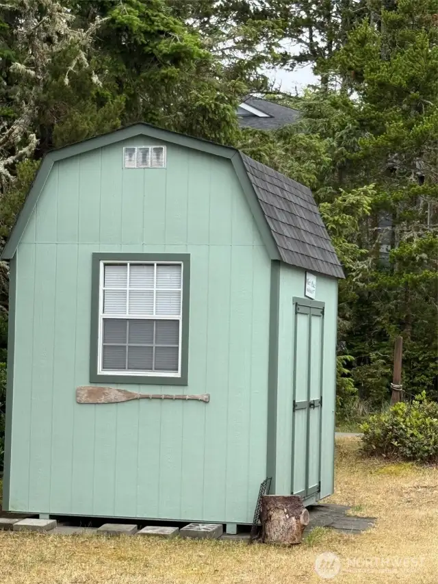 Storage shed with a sleeping or storage loft.