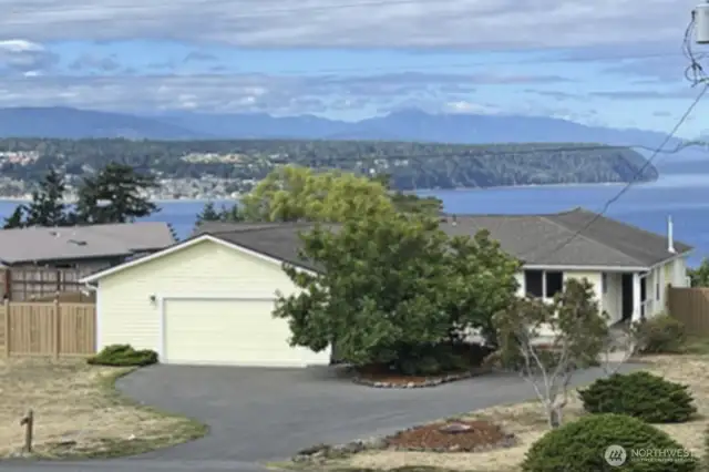 A move-in ready beautifully finished remodeled interior home awaits you, in desirable Cape George Colony.