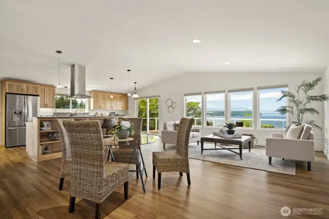 As you enter the front door, you will be immediately greeted by the gorgeous views of the water, boats, and mountains beyond.  Your view is to the west - so yes!  Gorgeous sunsets too.  And what a beautiful room