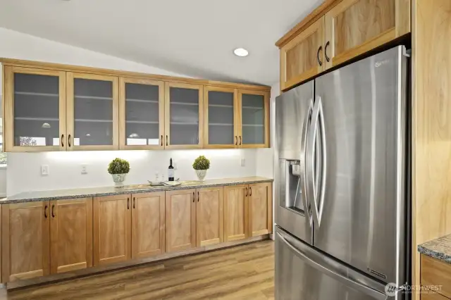 Look at this marvelous built in lighted buffet counter, with storage above and below