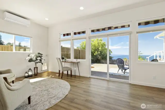 What a gorgeous view from the second bonus room, which has a sllding door to the sunny patio.  Special features in this room include an automated retractable awning and an electronic dog door to the dog run.