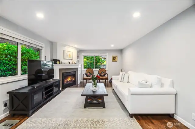 A space to relax after a long day, this great room features a gas fireplace to warm those cold PNW evenings.