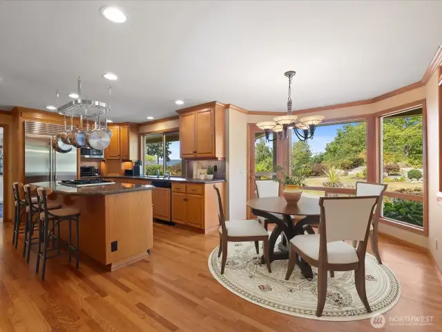 Chef Inspired Kitchen and Eating Space with Views of the Gorgeous Backyard, Puget Sound, Olympic Mountains, Whidbey Island and PNW Sunsets