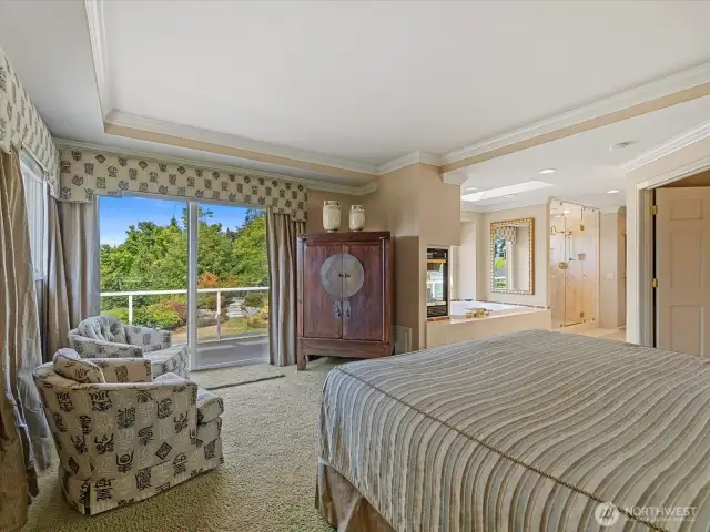 Primary with Access to the Deck and Views of Puget Sound, The Lush Landscaped Yard and  Cascading Water Feature