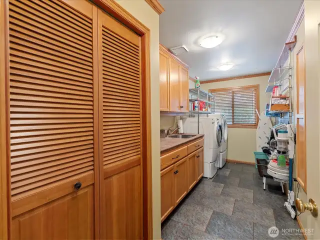 Utility Room with Washer/Dryer, Storage Closet and Deep Sink