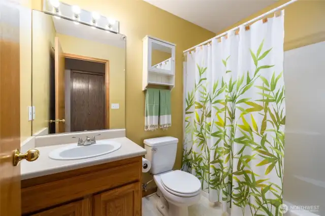 Full bathroom, with tub and shower.