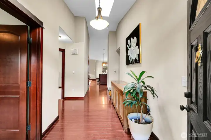 Step into a warm entryway that leads seamlessly to the great room and kitchen.