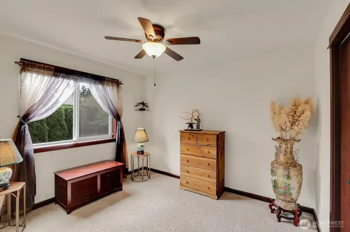 Bedroom 2 offers generous space and versatility for family, guests, or an office.