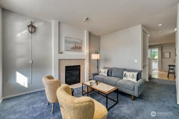 Upper level Floor 2 open living area with gas fireplace.