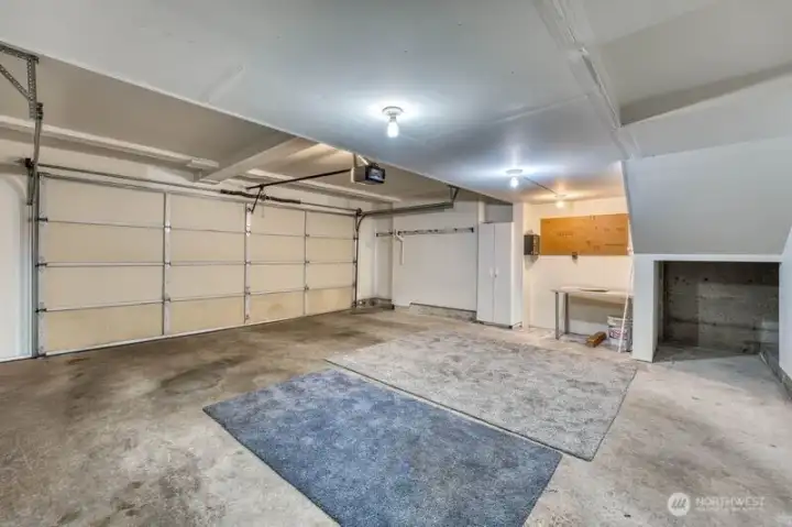 Large double car garage with additional storage.  Drive right in from the street!
