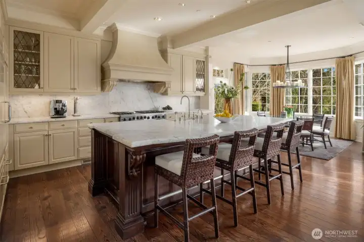 Expansive kitchen with oversized island seating and abundant natural light.