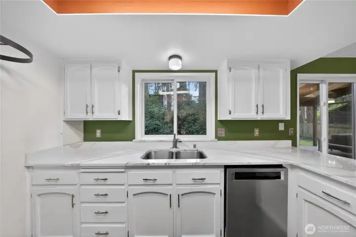 Updated kitchen with stainless steel appliances,