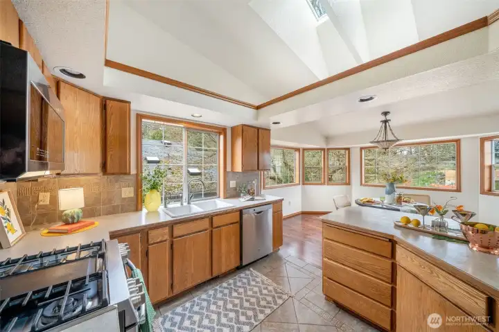 Plenty of storage space in this kitchen, bathed with natural light all around and from above.