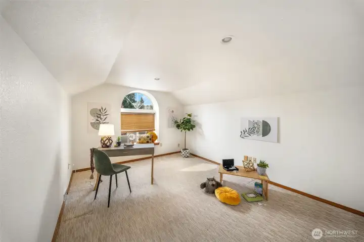 Bonus room over the garage perfectly placed as a private office-after work hours hang out room.