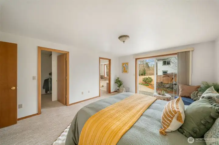 Door on the right leads to the 5 piece primary bathroom, door on the left to the walk in closet.