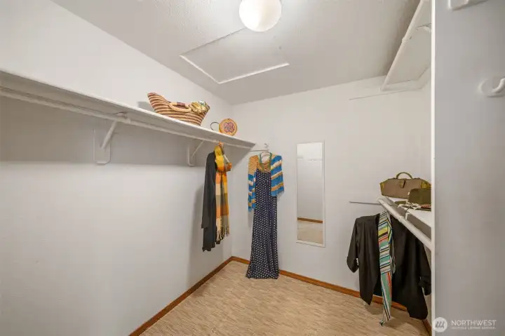 The primary bedroom's walk in closet.