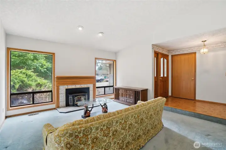 Living room with fireplace, carpet