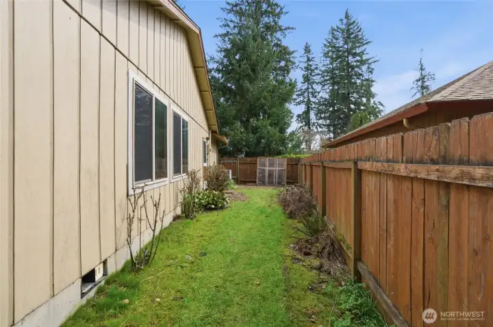 Side of yard, fenced