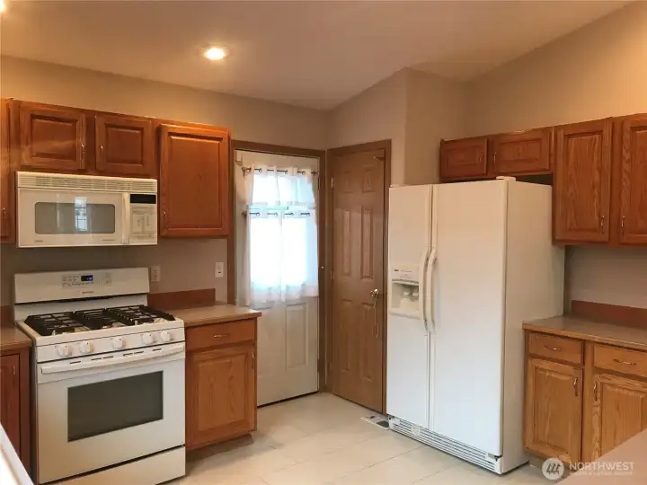 Kitchen with door to backyard!