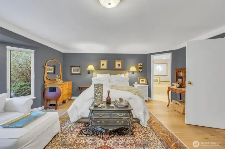 Primary bedroom has a coffee bar with sink, gas fireplace and access to back deck/yard.