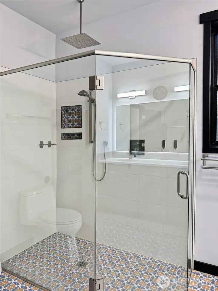 Walk in shower with very cool tile. Walk in shower with very cool tile.