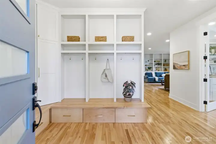 Fantastic entry way with plenty of places for coats, shoes and more.