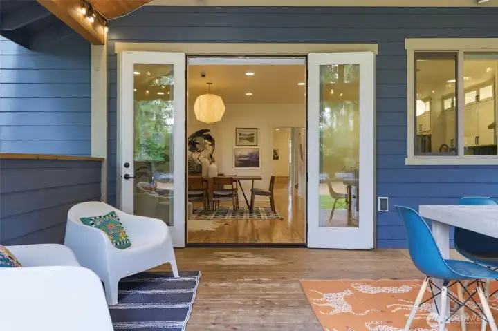 French doors open from the kitchen outside.