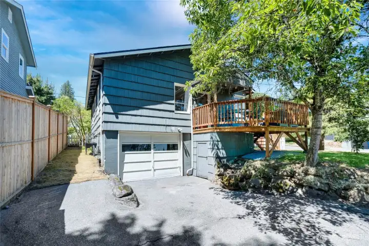 The back side of the home has what used to be the garage, but is now only used as additional storage space.