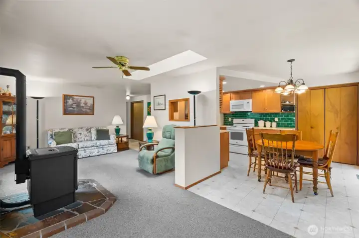 Living room with pellet stove, eating space & kitchen Living room with pellet stove, eating space & kitchen
