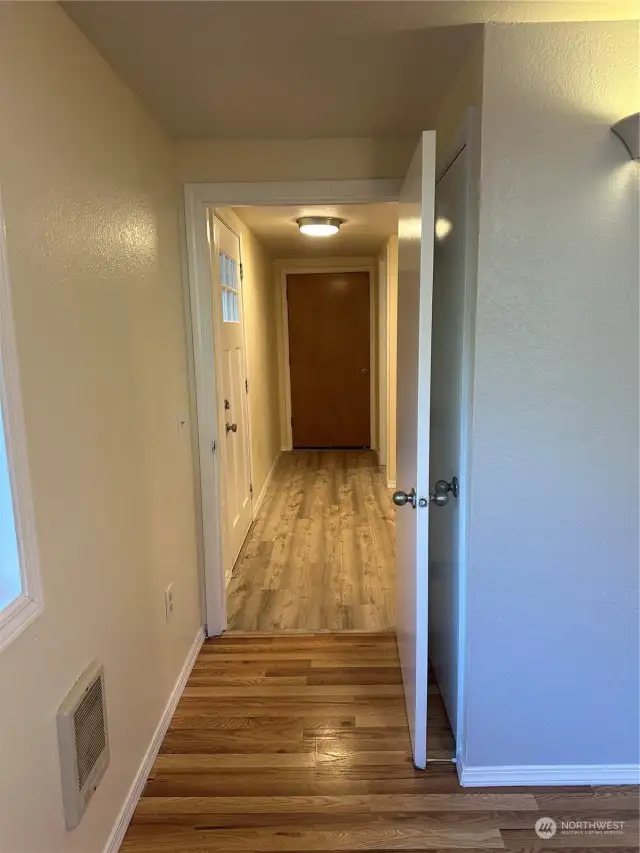 Hallway to utility room and garage