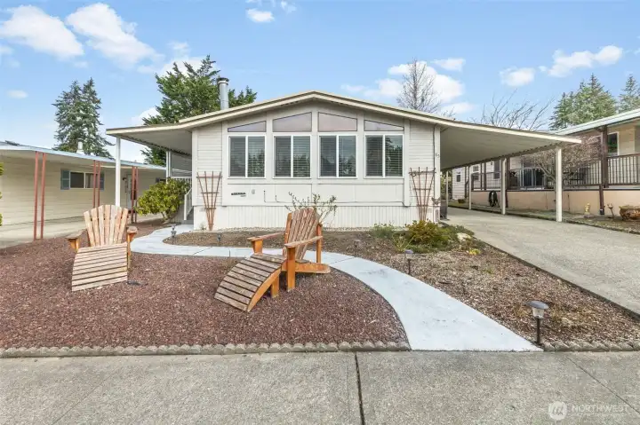 Easy to maintain front yard with pathway leading to front door
