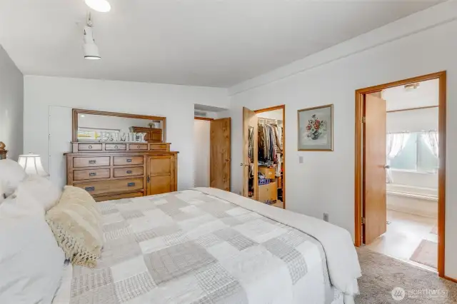 Primary bedroom leads into 5 piece bath