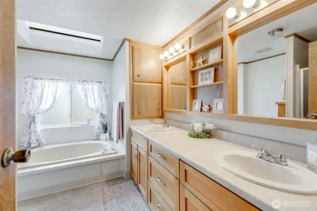 Primary bathroom features double sinks & soaking tub