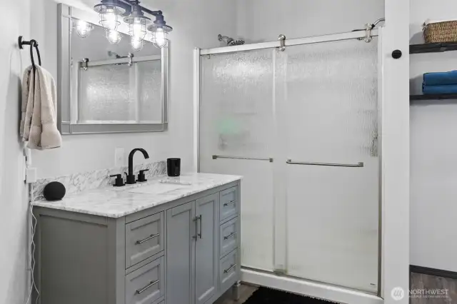 Primary en suite bath- step in shower but has a nook perfect for a freestanding bath tub