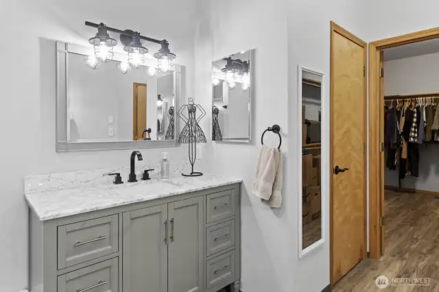 Instead of a double vanity there are two separate sinks/vanities in primary