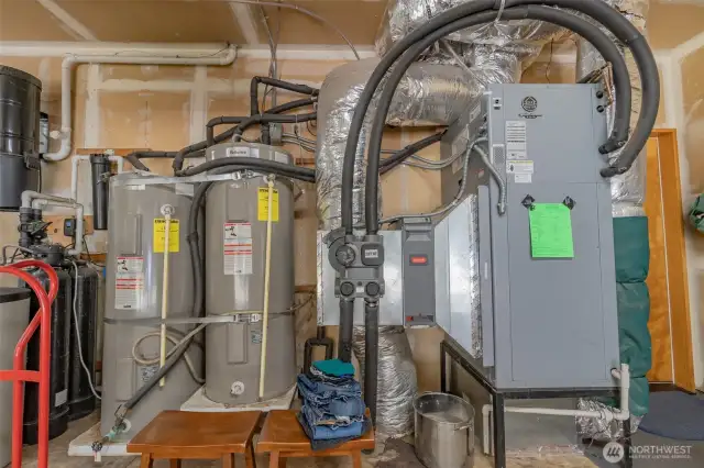 Geothermal hot water with two tanks- geo heats, and transfers hot to conventional hot water heater.