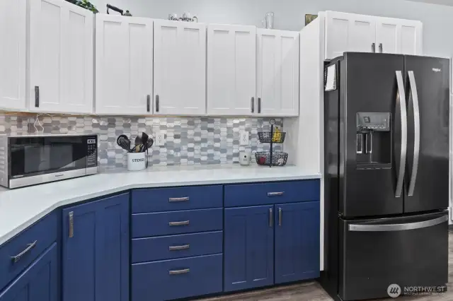 Two tone custom painted cabinetry, lots of storage