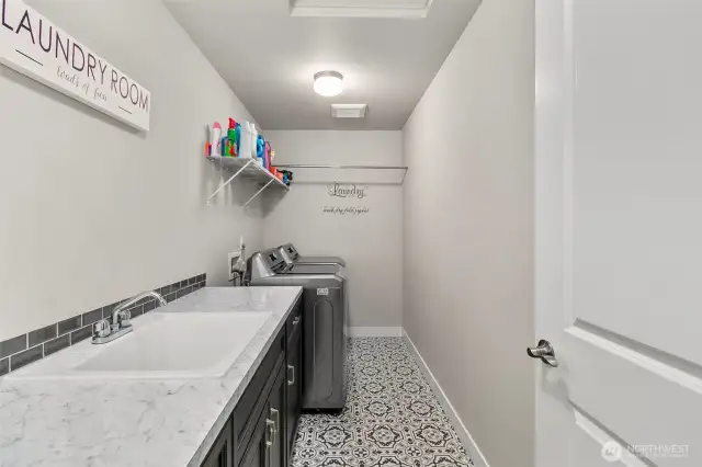 Spacious Upstairs Utility Room with counter space.
