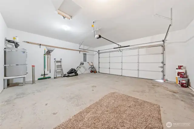 Two car garage with ample storage space.